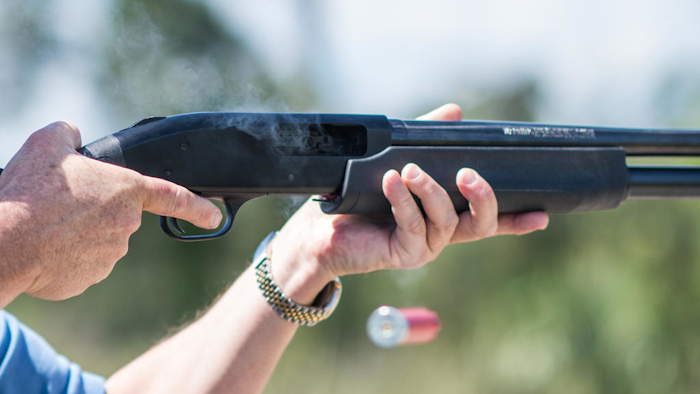 Jonathan Mossberg, whose iGun Technology Corp. is working to develop a 'smart gun,' demonstrates the firearm, in Daytona Beach, Fla. (AP Photo/Lisa Marie Pane)