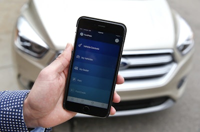 Automakers are reinventing themselves as 'mobility' companies that can accommodate all the different ways people get around. Ford created a technology-focused division based in Silicon Valley that will invest in promising transportation startups. It also launched FordPass, a smartphone app that helps users find parking or share their cars. (AP Photo/Paul Sancya)