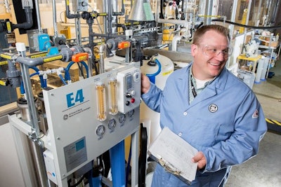 Jason Nichols at work on GE's waste water monitoring sensors. (Image credit: GE Global Research)