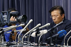 Mitsubishi Motors Corp. President Tetsuro Aikawa speaks during a press conference in Tokyo, Wednesday, May 18, 2016. (AP Photo/Shizuo Kambayashi)