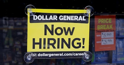 In this Wednesday, May 18, 2016, photo, a 'Now Hiring' sign hangs in the window of a Dollar General store in Methuen, Mass. On Wednesday, June 8, 2016, the Labor Department reports on job openings and labor turnover for April. (AP Photo/Charles Krupa)