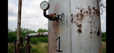 In this Friday, May 13, 2016, photo, oil equipment sits idle on a South Texas ranch near Bigfoot, Texas. The agencies that regulate the oil and gas industry are running out of money just as some problems in the oilfields are worsening. Meanwhile, defunct companies are abandoning wells that are in danger of deteriorating. (AP Photo/Eric Gay)