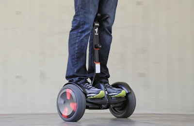 Hoverboards are attempting a comeback in the U.S., months after videos showing them bursting into flame went viral. (AP Photo/Reed Saxon)