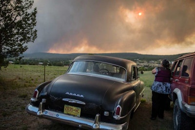 The so-called 'Dog Head Fire' in part of the Cibola National Forest east of Los Lunas started Tuesday and grew to over a square mile by Wednesday morning after its growth slowed overnight. (Roberto E. Rosales/The Albuquerque Journal via AP)