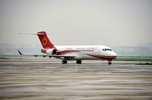 The first regional jet produced in China's initiative to compete in the commercial aircraft market made its debut flight Tuesday carrying 70 passengers. (Chinatopix via AP)