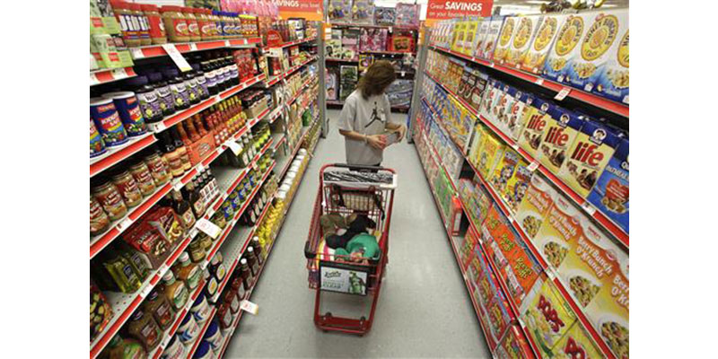 Up and down supermarket aisles, rows of perfectly placed products reflect calculated deliberations aimed at getting shoppers to spend more. Take cereal, for example. Research published in the Journal of Environment and Behavior found that kids’ cereals tended to be placed on lower shelves where they are more eye-level with children. It’s just one example of the tactics food companies and supermarkets use to sway what people put in their carts. (AP Photo/Tony Gutierrez, File)