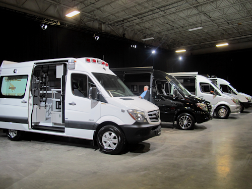 Mercedes-Benz vans are lined up in North Charleston, S.C., on Wednesday, July 27, 2016, at the groundbreaking ceremony for company's new $500 million U.S. plant. The company says the first vans will roll off the assembly line by the end of the decade. The plant is expected to employ about 1,300 workers. (AP Photo/Bruce Smith)