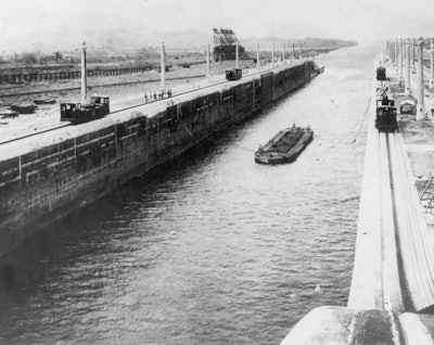 The electric mules are returning a barge through Gatun Locks to Atlantic level during the first trial run in 1914. (Image credit: Museum of Innovation and Science Schenectady)