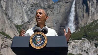 President Barack Obama speaks by the Sentinel Bridge in the Yosemite Valley, in front of Yosemite Falls which is the highest waterfall in the park at Yosemite National Park, Calif., on Saturday, June 18, 2016. (AP Photo/Jacquelyn Martin)