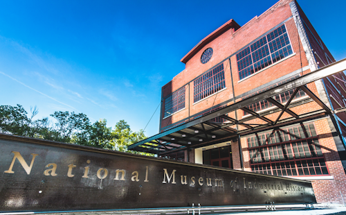 This July 25, 2016, handout photo provided by the National Museum of Industrial History shows the exterior of the museum, housed in a century-old building at the former Bethlehem Steel plant in Bethlehem, Pa. The National Museum of Industrial History opened Tuesday, Aug. 2, 2016, after nearly 20 years of planning, and the Smithsonian Institution-affiliated museum is located on what was once one of America's largest abandoned industrial sites where it joins the nearby Sands Casino Resort Bethlehem and a thriving arts complex called SteelStacks. (Glenn Koehler/National Museum of Industrial History via AP)