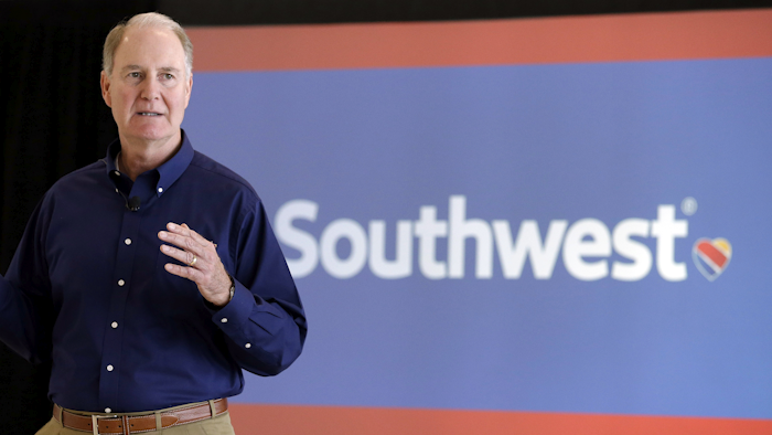 Southwest Airlines CEO Gary Kelly speaks during a preview of the new international concourse at Houston Hobby Airport in Houston. Two major unions at Southwest Airlines are demanding that the carrier replace Kelly because of the technology outage that caused the airline to cancel or delay thousands of flights in July. (AP Photo/Pat Sullivan, File)
