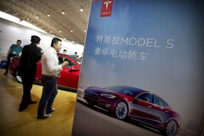 Tesla said August 15, 2016, that the removal of the term autopilot from its website for China was a mistake and the term is being restored. (AP Photo/Mark Schiefelbein, File)