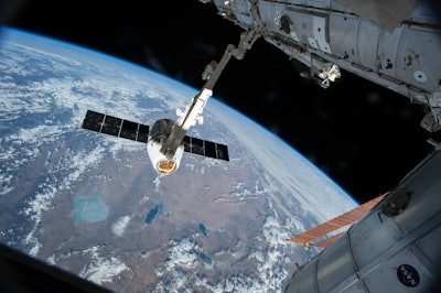 Americans haven't rocketed into orbit from their home turf since NASA's last shuttle flight in 2011. SpaceX and Boeing expect to resume human launches from Cape Canaveral in another year or two. (AP Photo/NASA)