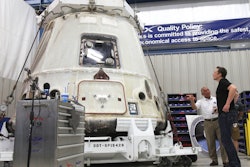 NASA Administrator Charles Bolden, second right, and SpaceX CEO Elon Musk, right, look at the SpaceX Dragon spacecraft at the SpaceX Rocket Development Facility in McGregor, Texas. (Duane A. Laverty/Waco Tribune-Herald via AP)