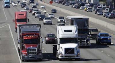 A new regulation posted Friday, Aug. 26, would impose the nationwide limit by electronically capping speeds with a device on newly-made U.S. vehicles that weigh more than 26,000 pounds (AP Photo/Ted S. Warren)