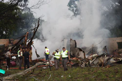 Authorities work the scene after a truck carrying Takata inflators and a volatile chemical exploded in the Texas border town of Quemado, killing a woman and injuring four others. (Ruben Carrillo Mazuka/The Eagle Pass News Gram via AP)