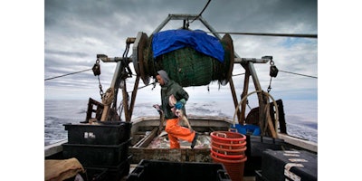 The United States and Canada have brokered a deal to share what's left of the dwindling North American cod fishing business in the Atlantic next year. The two fisheries overlap in the eastern reaches of Georges Bank, an important fishing area located off of New England. (AP Photo/Robert F. Bukaty, file)