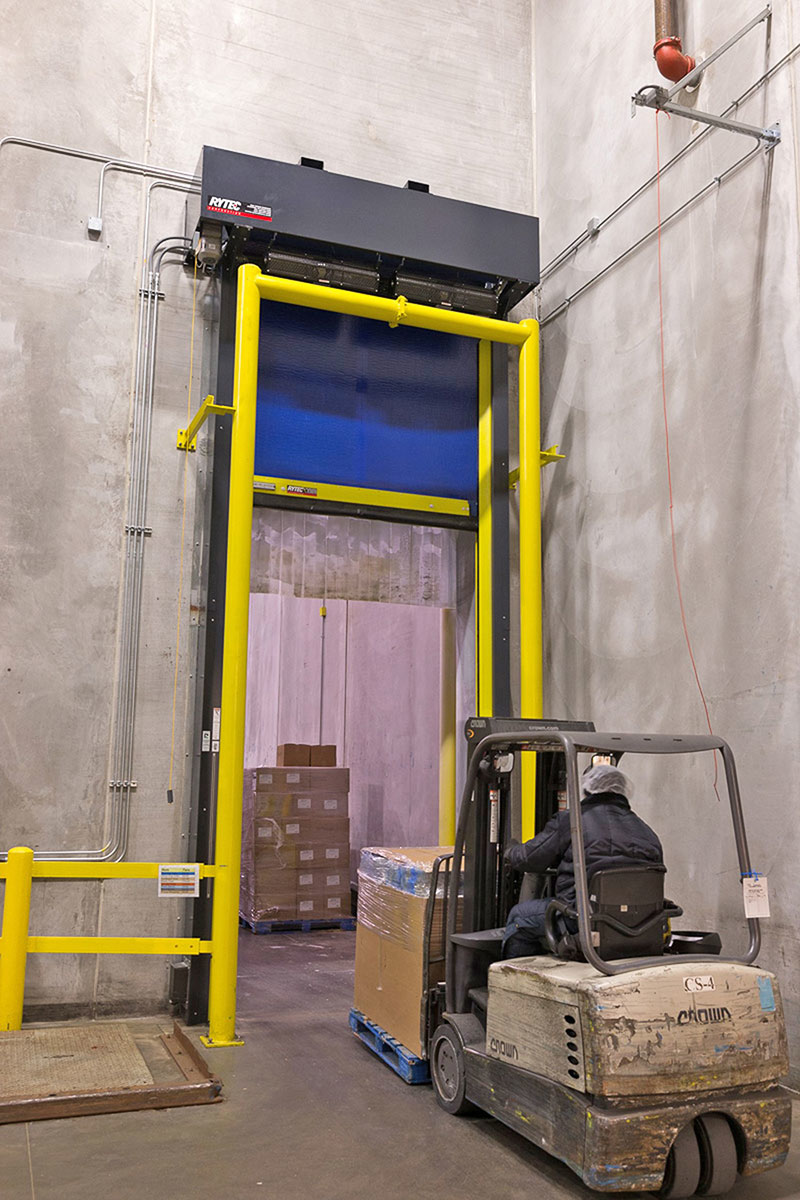 Forklift traffic accesses the frozen storage room at Palermo’s Pizza. Photo courtesy of Rytec High-Performance Doors