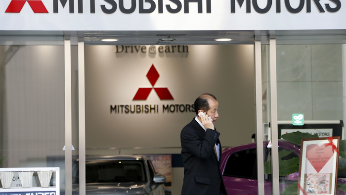 Japanese transport ministry officials raided the Tokyo headquarters of scandal-ridden Mitsubishi Motors Corp. Friday, Sept. 2, 2016 after the government alleged the automaker cheated on mileage ratings on more models than earlier reported. (AP Photo/Koji Sasahara, File)