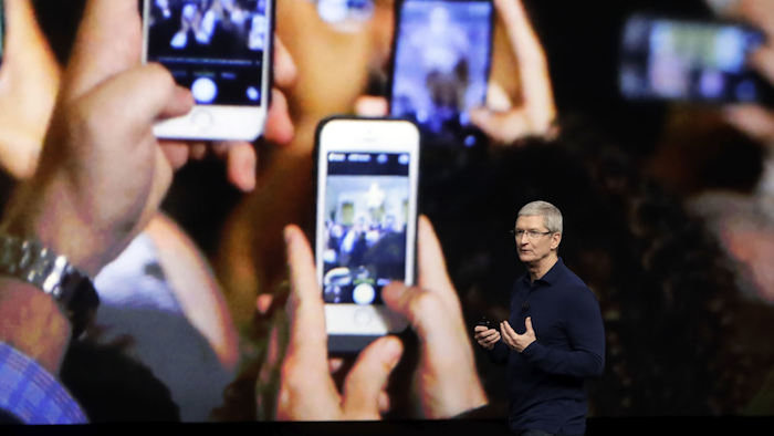 Apple CEO Tim Cook announces the new iPhone 7 during an event to announce new products Wednesday, Sept. 7, 2016, in San Francisco. (AP Photo/Marcio Jose Sanchez)