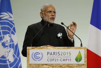 India's Prime Minister Narendra Modi addresses world leaders at the COP21, United Nations Climate Change Conference, in Le Bourget, outside Paris. (AP Photo/Michel Euler, File)