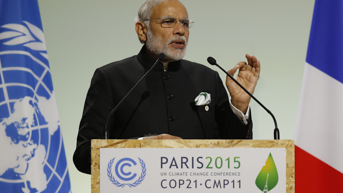 India's Prime Minister Narendra Modi addresses world leaders at the COP21, United Nations Climate Change Conference, in Le Bourget, outside Paris. (AP Photo/Michel Euler, File)