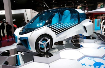 A Toyota FGV Plus concept car on display at the Paris Motor Show in Paris, France, Thursday, Sept. 29, 2016. (AP Photo/Michel Euler)