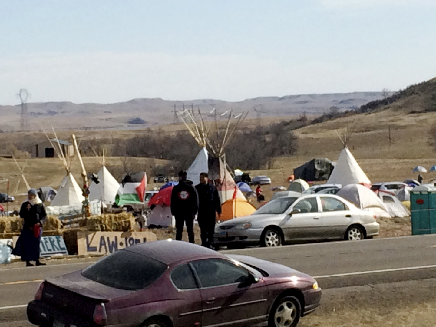 Teepees and numerous tents are set up Monday, Oct. 24, 2016, by Dakota Access oil pipeline protesters in southern North Dakota on property owned by the pipeline company. Protesters say they have treaty rights to the land from the 1800s. (AP Photo/Blake Nicholson)
