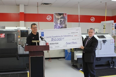 Neil McGill (left), Director of Operations at Allendale Machining, presenting $50,000 check from the Gene Haas Foundation to Joe Bellucci, Director of Education at Lincoln Tech in Mahwah, NJ to provide scholarships for students in the school's CNC Machining and Manufacturing program. (PRNewsFoto/Lincoln Educational Services Co)
