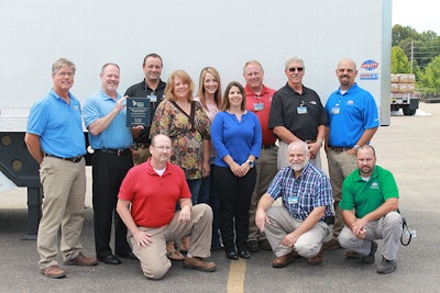 Standing-Left to right: David Neighbors, Dale Innis of Liberty Mutual, Bobby Wilson, Hope Lutrell, Mary Pierce, Rachell Boudreau, John Oliver, Jim Rison and Jeremy Dogan. Kneeling-Left to right: Sean Graddy, Scott Maxwell and Joe Upchurch (Photo: Business Wire)