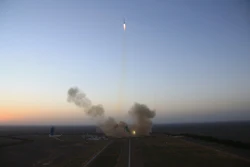 In this photo released by Xinhua News Agency, the Long March-2F carrier rocket carrying China's Shenzhou 11 manned spacecraft blasts off from the launch pad at the Jiuquan Satellite Launch Center in Jiuquan, northwest China's Gansu Province, Monday, Oct. 17, 2016. (Ju Zhenhua/Xinhua via AP)