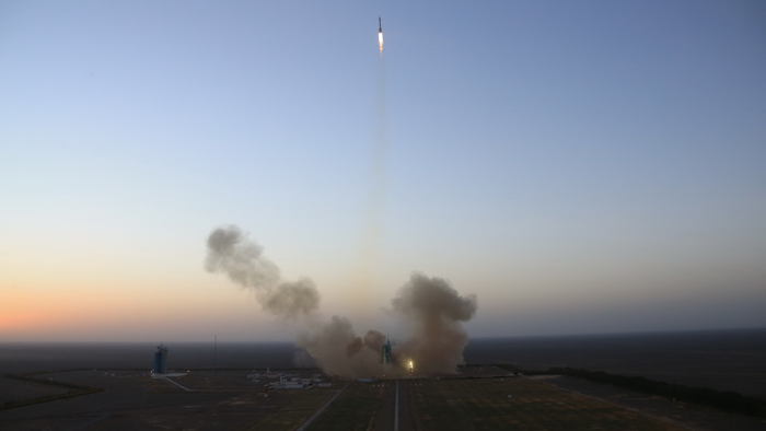 In this photo released by Xinhua News Agency, the Long March-2F carrier rocket carrying China's Shenzhou 11 manned spacecraft blasts off from the launch pad at the Jiuquan Satellite Launch Center in Jiuquan, northwest China's Gansu Province, Monday, Oct. 17, 2016. (Ju Zhenhua/Xinhua via AP)