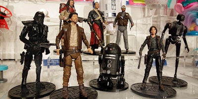 This Thursday, Oct. 6, 2016, photo shows the Star Wars Rogue One Elite Series characters, from The Disney Store, on display at the annual TTPM Holiday Showcase, in New York. Toy companies are offering products that are more inclusive, from Barbie dolls in all shapes, sizes and skin tones to baby dolls aimed at boys. Toy companies are also offering dolls that represent different disabilities. But still experts and parents say more work needs to be done. (AP Photo/Richard Drew)