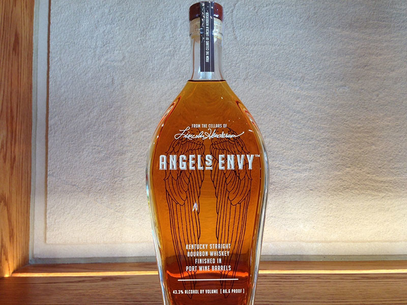 A bottle of Angel’s Envy bourbon is displayed at the gift shop of Angel's Envy distillery, in Louisville, Ky. Visitors to Louisville’s newest distillery raised glasses Wednesday to toast the opening of the Angel’s Envy facility in a high-profile location downtown. Tourism officials are celebrating another sign of bourbon’s momentum in a city riding a wave of whiskey-inspired tourism. (AP Photo/Bruce Schreiner)
