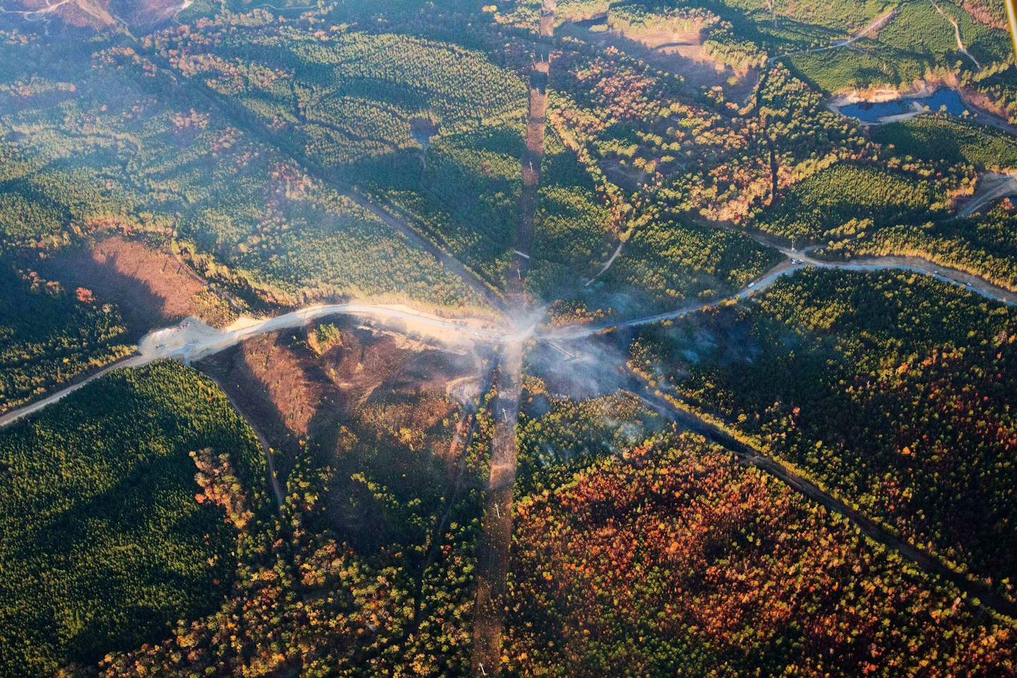 The blast, which sent flames and thick black smoke soaring over the forest, happened about a mile west of where the pipeline ruptured in September, Gov. Robert Bentley said in a statement. (AP Photo/Brynn Anderson)