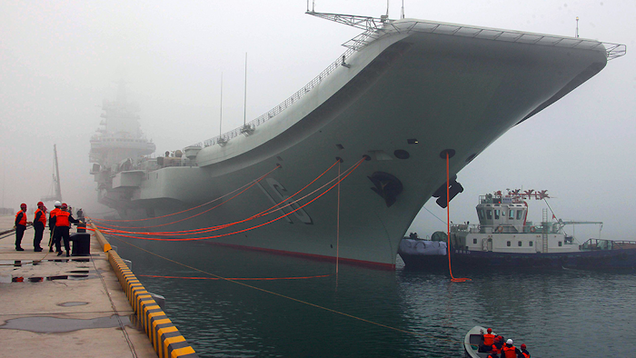 The Liaoning's political commissar Senior Captain Li Dongyou said China's first aircraft carrier is now ready to engage in combat, marking a milestone for a navy that has invested heavily in its ability to project power far from China's shores. (AP Photo/Xinhua, Li Tang, File)