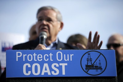 Democratic U.S. Sen. Bob Menendez addresses a large rally in Asbury Park, N.J., opposing federal plans that would allow oil and gas drilling in the Atlantic Ocean. The Obama administration has moved to restrict access to offshore oil drilling leases in the Atlantic, as well as off Alaska. But President-elect Trump has said that he intends to open up offshore drilling, and environmentalists and coastal businesses say it could be the first major fault line that divides them from the new president. (AP Photo/Mel Evans, File)