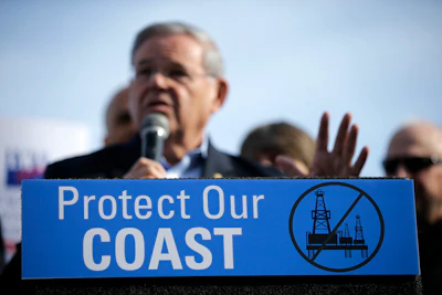 Democratic U.S. Sen. Bob Menendez addresses a large rally in Asbury Park, N.J., opposing federal plans that would allow oil and gas drilling in the Atlantic Ocean. The Obama administration has moved to restrict access to offshore oil drilling leases in the Atlantic, as well as off Alaska. But President-elect Trump has said that he intends to open up offshore drilling, and environmentalists and coastal businesses say it could be the first major fault line that divides them from the new president. (AP Photo/Mel Evans, File)