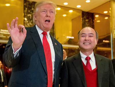 In this Tuesday, Dec. 6, 2016, file photo, President-elect Donald Trump, left, accompanied by SoftBank CEO Masayoshi Son, speaks to members of the media at Trump Tower in New York. Trump gave himself kudos for the creation of 8,000 new U.S. jobs by Japanese tech mogul Son, saying it was proof of 'the spirit and the hope' stirred by his presidential win. But for those particular jobs, Trump was basically taking a bow for the second time. (AP Photo/Andrew Harnik, File)