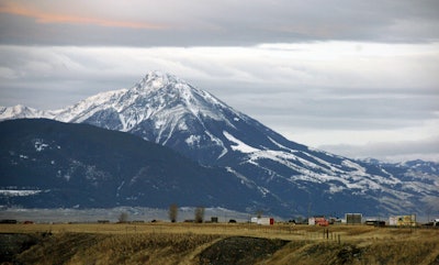 This Nov. 21, 2016 file photo shows Emigrant Peak towering over the Paradise Valley in Montana north of Yellowstone National Park, the day U.S. officials announced a ban on new mining claims across more than 30,000 acres in the area. President Barack Obama will leave behind a host of disputed actions and unfinished business on the environment, from blocked energy leases and mining projects to recent pollution restrictions and decisions on hundreds of potentially-imperiled species. Republicans emboldened by Donald Trump's victory are gearing up to reverse many of the administration's signature environmental moves. (AP Photo/Matthew Brown, File)