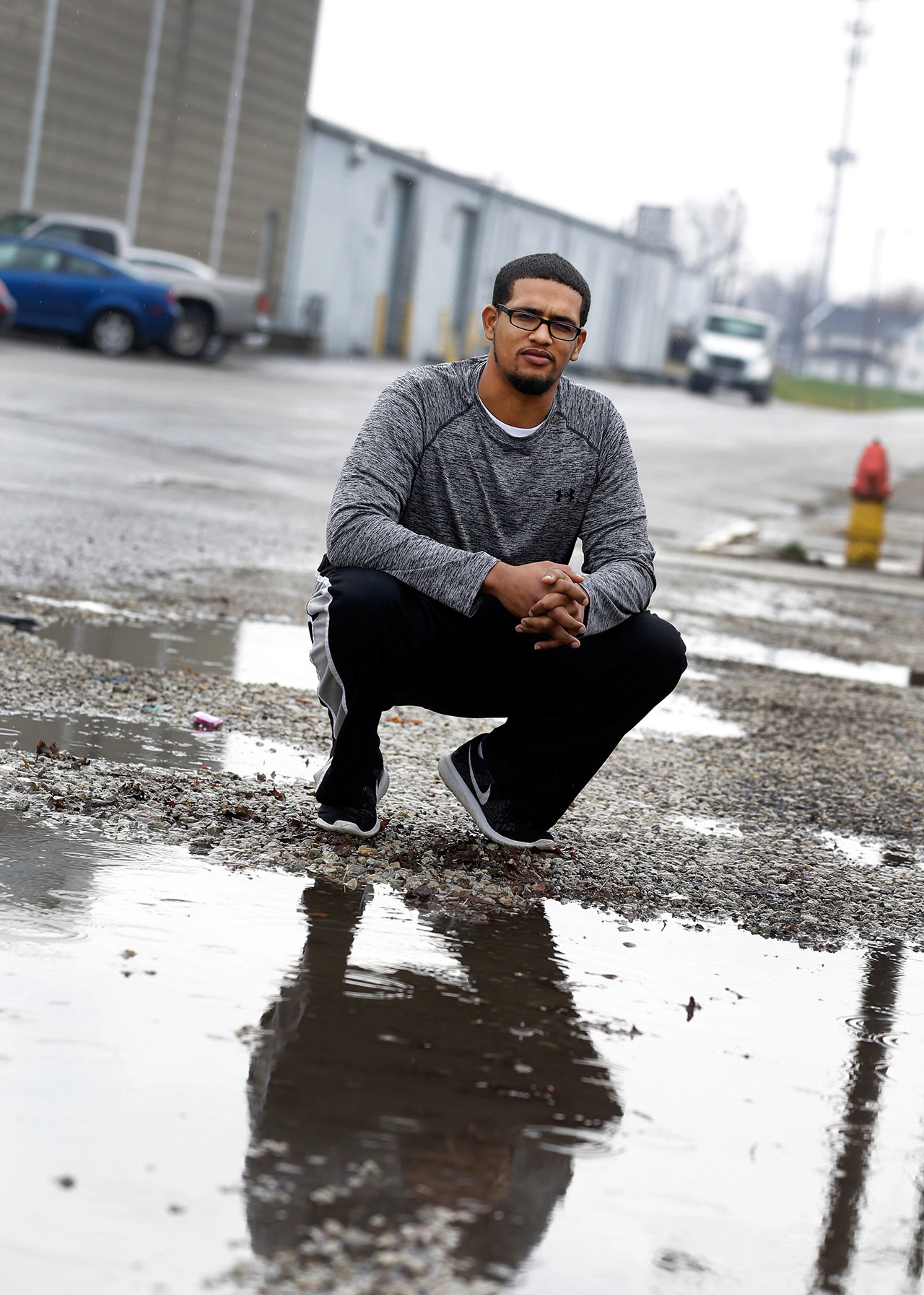 Blake Hancock, of Marion, Ind., poses outside his union's meeting hall in Huntington, Ind., Tuesday, Dec. 6, 2016. Hancock works at the United Technologies Electronic Controls factory in Huntington along with his mother and his aunt. While he's grateful for the jobs that are staying in Indiana, the 25-year-old believes Trump was trying to buff up his image, not protect workers. 'There are still 1,300 people who are losing their jobs,' Hancock said. 'I feel like it was a numbers game ... to buy the favor of the American public.' (AP Photo/Michael Conroy)