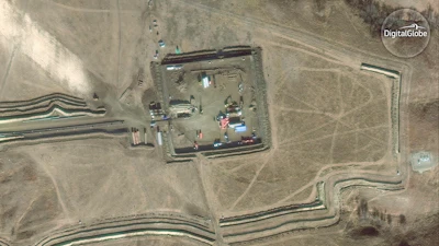 In this Nov. 25, 2016 satellite image taken by DigitalGlobe, the construction site of the the Dakota Access pipeline is seen near Cannon Ball, N.D. (DigitalGlobe via AP)