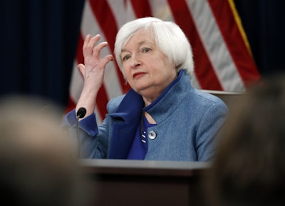 The Federal Reserve is raising a key interest rate for the first time in a year, reflecting a resilient U.S. economy and expectations of higher inflation. The move will mean modestly higher rates on some loans. (AP Photo/Alex Brandon)