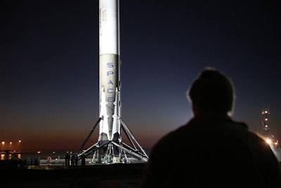 The SpaceX Falcon 9 rocket booster makes it's way into the port of Los Angeles Tuesday morning, Jan. 17, 2017. (Chuck Bennett /The Daily Breeze via AP)