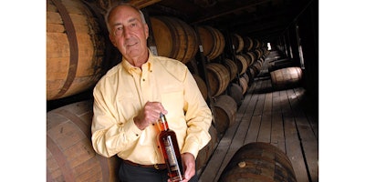 In this 2006 file photo, Heaven Hill's master distiller Parker Beam holds a bottle of Rittenhouse Rye Whisky made at the Bardstown, Ky. distillery. (ASSOCIATED PRESS)