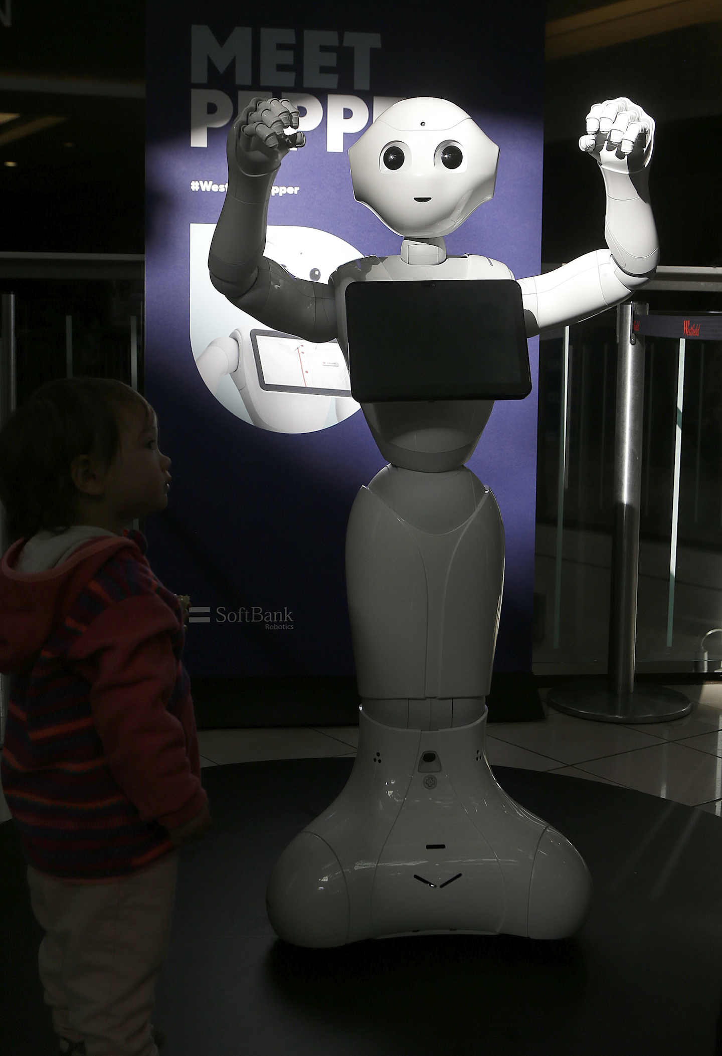 This Thursday, Dec. 22, 2016, file photo, shows Pepper the robot at Westfield Mall in San Francisco. The SoftBank Robotics humanoid robot can greet shoppers and has the potential to send messages geared to people’s age and gender through facial recognition. (AP Photo/Jeff Chiu, File)