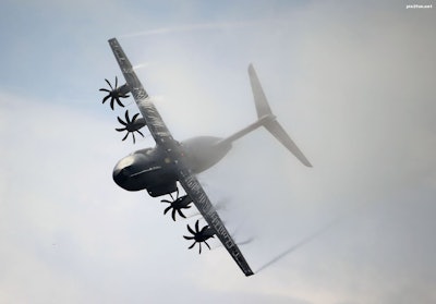 This Thursday, June 20, 2013, file photo shows an Airbus A400M performing its demonstration flight during the 50th Paris Air Show at Le Bourget airport, north of Paris, France. Surprise new costs for the long-troubled Airbus A400M military jet sent the European planemaker's profits plunging last year despite a rise in commercial aircraft deliveries, Airbus reported Wednesday Feb. 22, 2017. (AP Photo/Francois Mori, File)