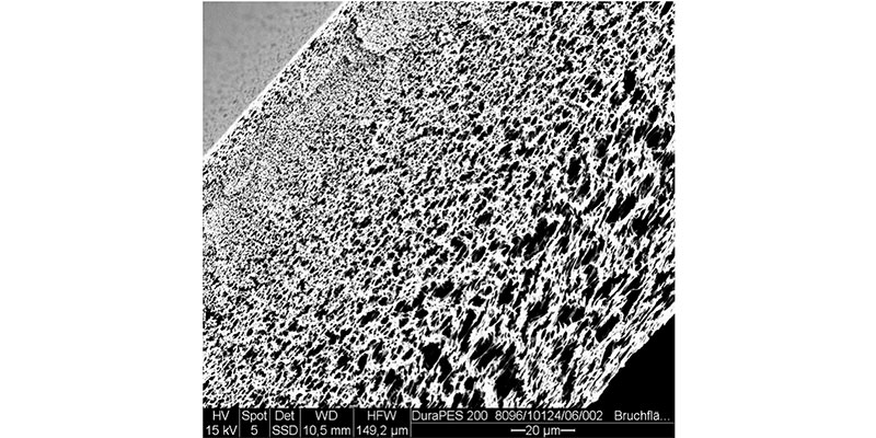Tapered pores in the membrane create a lower pressure drop and greater throughput, which both save energy. (Donaldson Company)