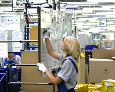 An assembly operator at work in one of Ficosa's advanced manufacturing facilities in Cookeville, TN. (Ficosa photo)