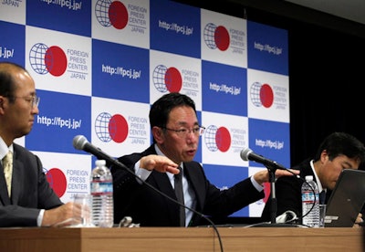 Naohiro Masuda, center, head of decommissioing for the damaged Fukushima nuclear plant, speaks at a news conference in Tokyo Thursday, March 2, 2017. (AP Photo/Mari Yamaguchi)
